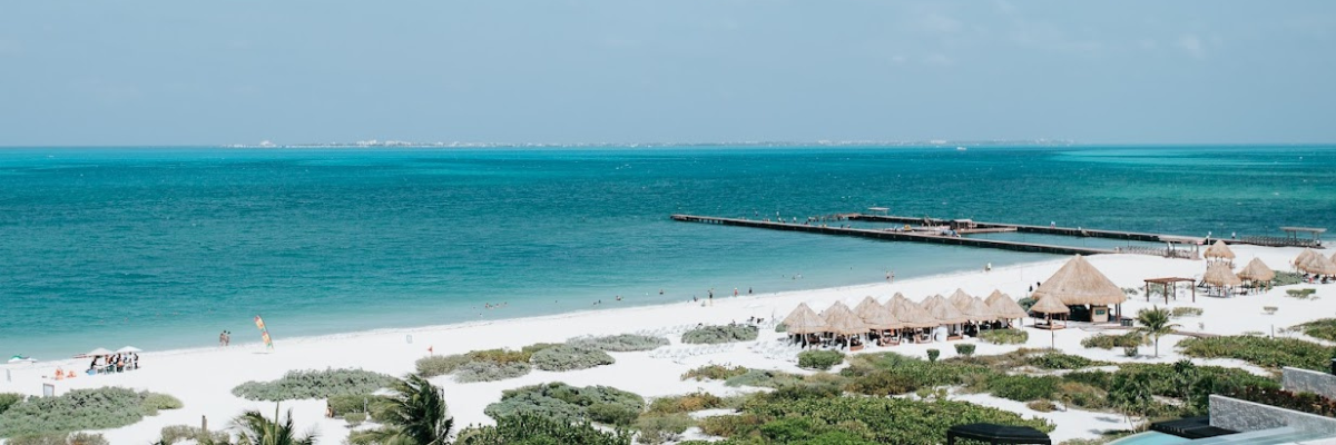 Ocean view from a resort with beach area and vast views of the blue ocean